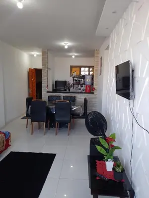Uma televisão e/ou sistema de entretenimento em Cantinho feliz