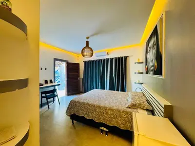 Uma cama ou camas num quarto em Enigma Casa Preá