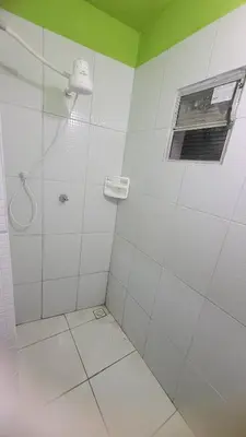 Uma casa de banho em Kitnet's 3 do Faustino