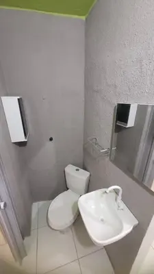 Uma casa de banho em Kitnet's 3 do Faustino