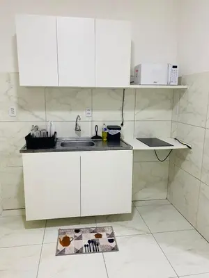 A cozinha ou kitchenette de Apartamento compacto com vista pro Mar 401