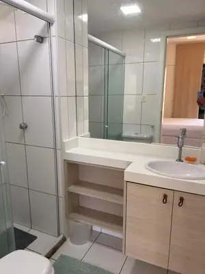 Uma casa de banho em Ap térreo no Beach Place ideal para família