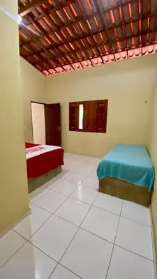 Uma cama ou camas num quarto em Sítio Jean Barros