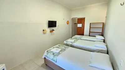 Uma cama ou camas num quarto em Toca da Ilha