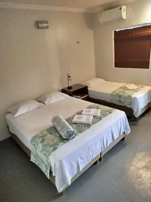 Uma cama ou camas num quarto em Toca da Ilha
