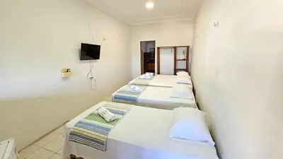 Uma televisão e/ou sistema de entretenimento em Toca da Ilha
