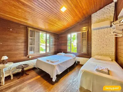 Uma cama ou camas num quarto em Linda casa ampla próximo ao mar do Cumbuco