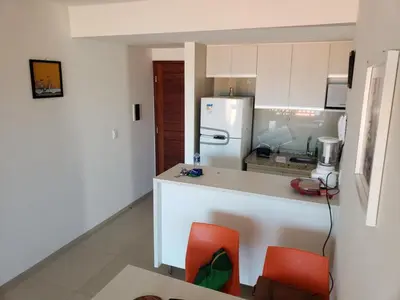 A cozinha ou kitchenette de Apartamento cumbuco 201