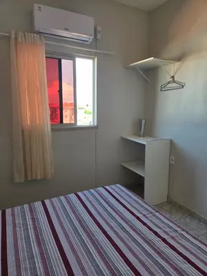 Uma cama ou camas num quarto em Residencial Vicente Mota Neto