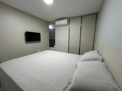 Uma cama ou camas num quarto em Atlântico Vista Mar