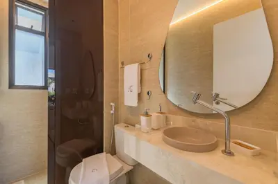 Uma casa de banho em JG Flecheiras