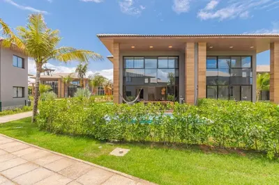 Um jardim no exterior de JG Flecheiras