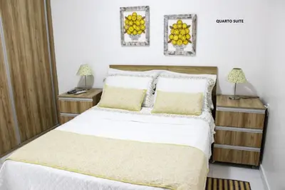Uma cama ou camas num quarto em Oasis de Iracema