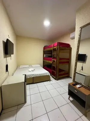 Uma cama ou camas num quarto em Por do Sol Praia Hotel