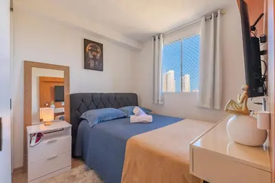 Uma cama ou camas num quarto em Mirante #1404 - Fortaleza por Carpediem