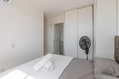 Uma cama ou camas num quarto em Mirante #804 - Apto em Fortaleza por Carpediem