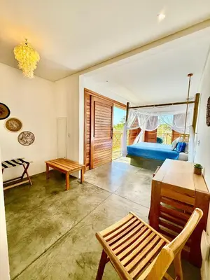 Uma cama ou camas num quarto em Villa Beleza Prea Beachfront private room