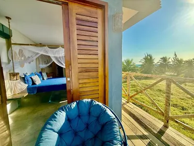 Uma varanda ou terraço em Villa Beleza Prea Beachfront private room