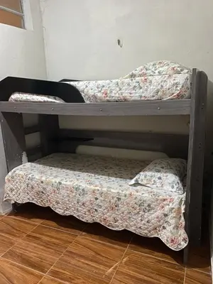 Uma cama ou camas num quarto em Casa de praia do pescador