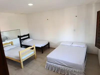 Uma cama ou camas num quarto em Casa dunna azul