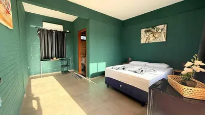 Uma cama ou camas num quarto em pousada calango