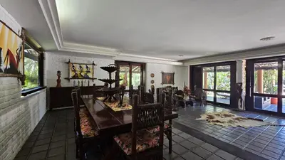 Uma televisão e/ou sistema de entretenimento em Mansao Santa Rita
