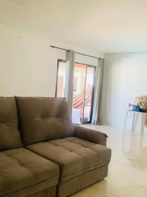 Uma área de estar em Casa Portal da Lagoinha