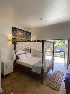 Uma cama ou camas num quarto em Casa Nossa Preá