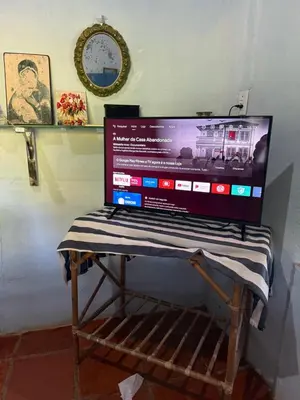 Uma televisão e/ou sistema de entretenimento em Mirante 180 - Praia de Barreiras