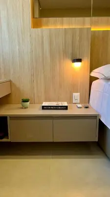 Uma cama ou camas num quarto em Apartamento luxuoso no Meireles