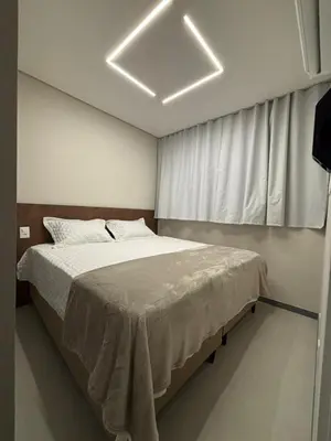 Uma cama ou camas num quarto em Conforto em Fortaleza