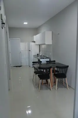 A cozinha ou kitchenette de Suítes House Cacique