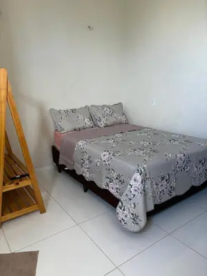 Uma cama ou camas num quarto em Casa jeri de prata 2