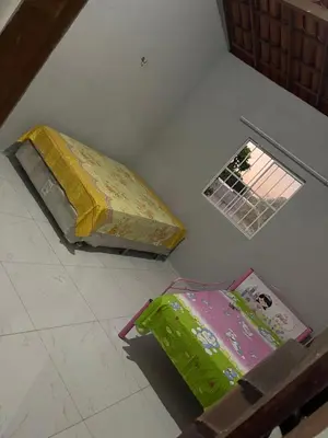 Uma cama ou camas num quarto em Chácara recanto do girassol