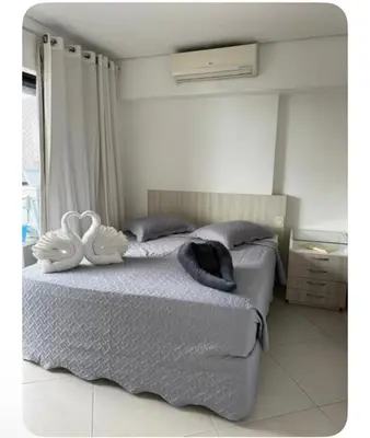 Uma cama ou camas num quarto em Apartamento 21 Fortaleza