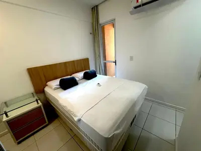 Uma cama ou camas num quarto em Palm Beach Living, ao lado do Beach Park