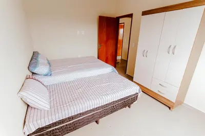 Uma cama ou camas num quarto em Casa em Barra Nova