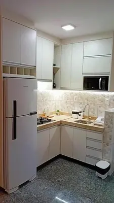 A cozinha ou kitchenette de Flat tullip flores 706