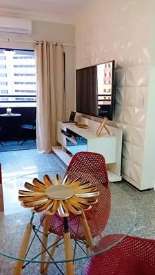 Uma televisão e/ou sistema de entretenimento em Flat tullip flores 706