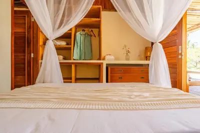 Uma cama ou camas num quarto em Casa Yemanjá
