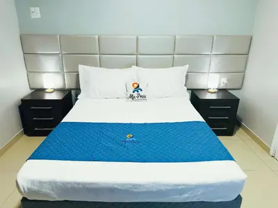 Uma cama ou camas num quarto em Happy Living Praia do Futuro