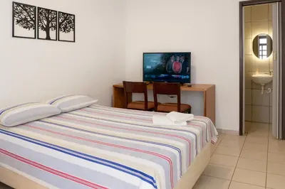 Uma cama ou camas num quarto em Maestro