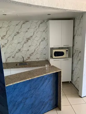 A cozinha ou kitchenette de FortalezAmar Hotel Praia Mansa