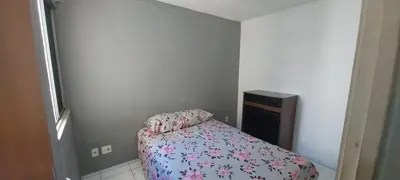 Uma cama ou camas num quarto em AP Bairro Araturi-Próximo a Praia do Icaraí Caucaia-CE