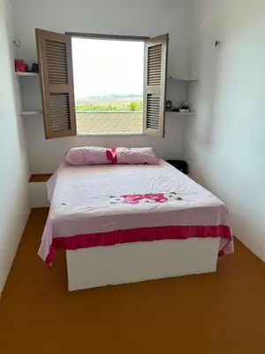 Uma cama ou camas num quarto em Family apartment near Beach Park