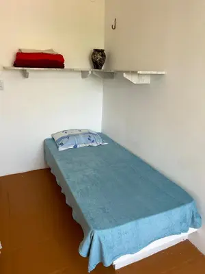Uma cama ou camas num quarto em Family apartment near Beach Park
