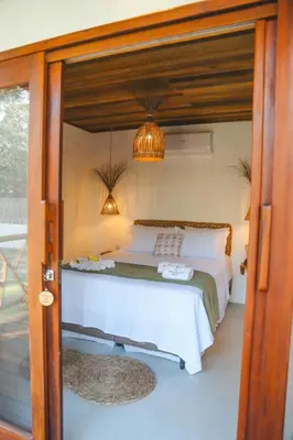 Uma cama ou camas num quarto em Villa Loui Beach Icaraizinho-Ce