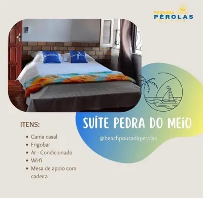 Uma cama ou camas num quarto em Pérolas Beach Hotel