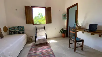 Uma cama ou camas num quarto em Casa da Tânia Preá