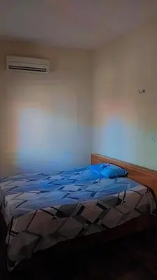 Uma cama ou camas num quarto em ChacaraSophya